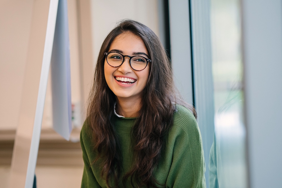 Woman smiling after dental treatment